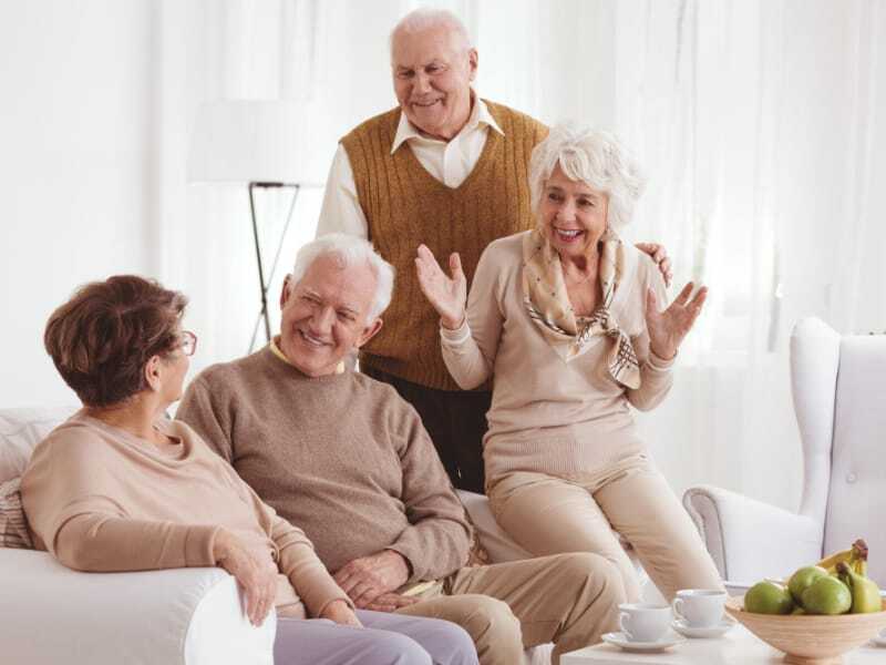 group of mature friends talking